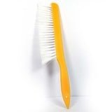 Brush with nylon bristles to gently sweep bees from the frame