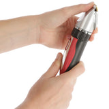 Tosatrice a batteria Sonic con cavo di carica collegato