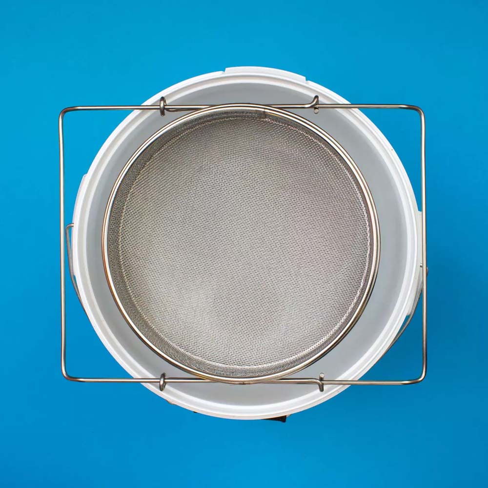 Large, double sieve with support bracket