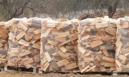 Getrocknetes Buchenbrennholz im Netz auf Einwegpalette, 800 kg